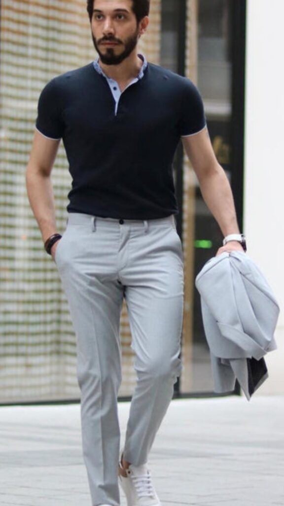 a man walking with his hands in his pockets