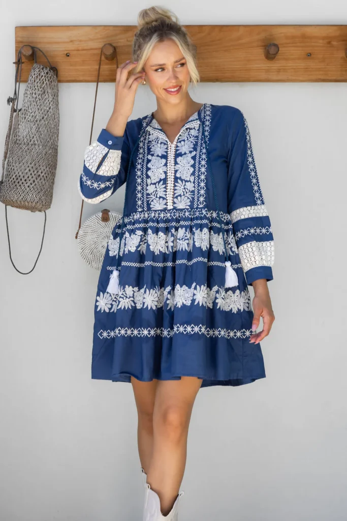 a woman in a blue dress