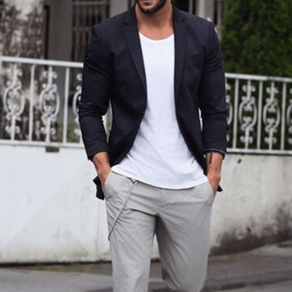 7 Stylish Ways to Rock a Plain White TShirt for Men A man wearing white T-shirt with grey chinos and a black blazer