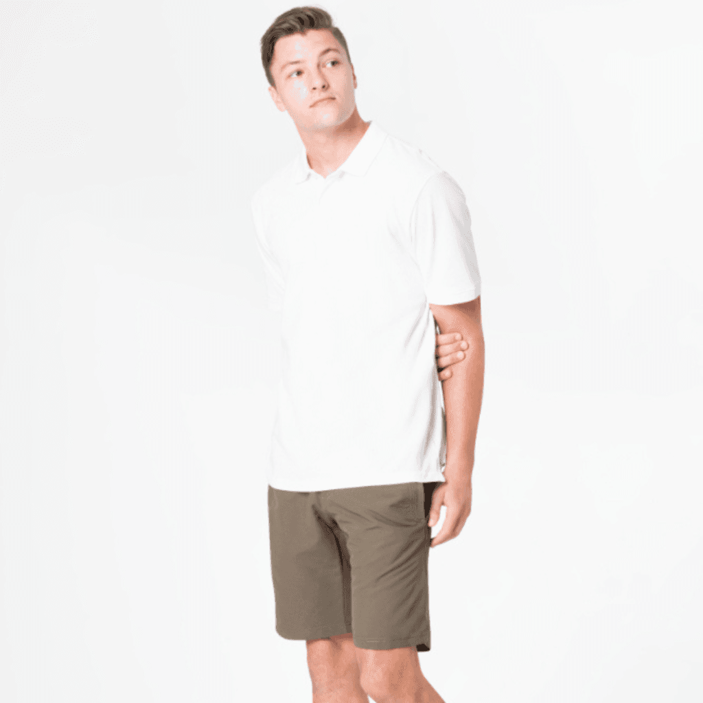 7 Stylish Ways to Rock a Plain White TShirt for Men a man wearing plain white t-shirt with brown shorts
