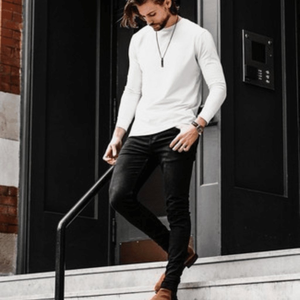 7 Stylish Ways to Rock a Plain White TShirt for Men a man wearing plain white t-shirt for men with black jeans and Chelsea boots
